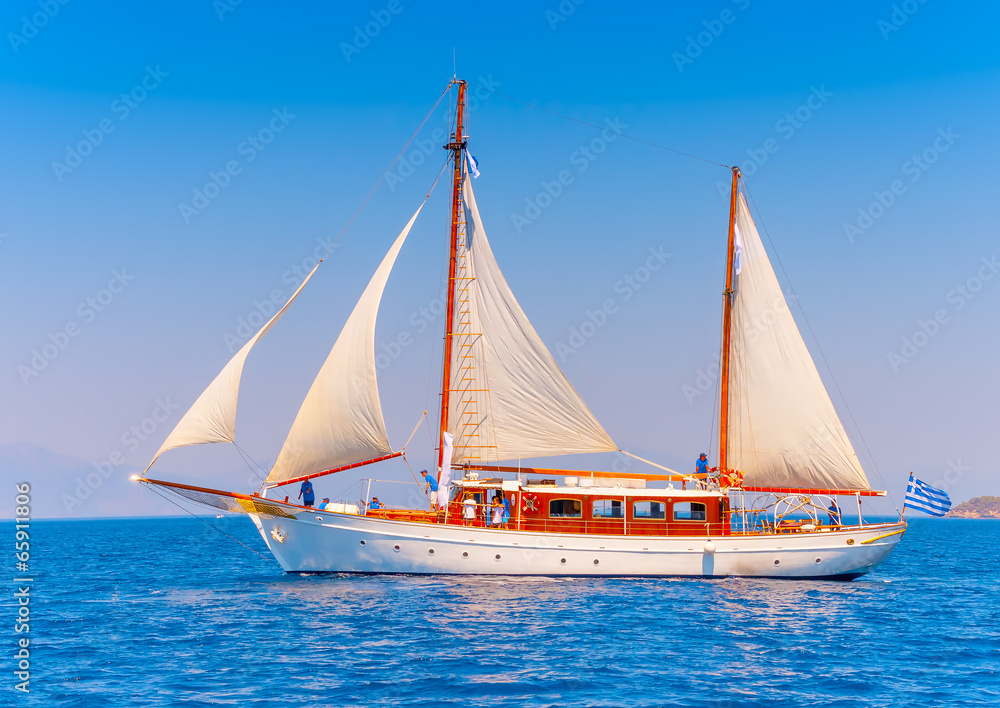 Naklejka premium Old classic wooden sailing boat, in Spetses island in Greece