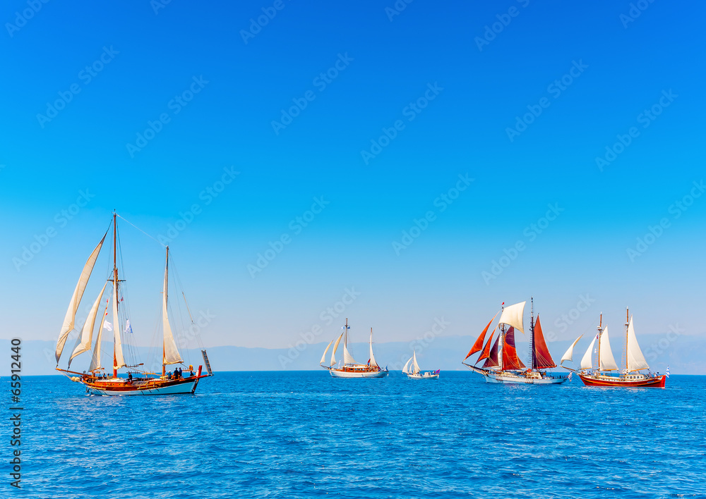 Naklejka premium several classic wooden sailing boats in Spetses island in Greece