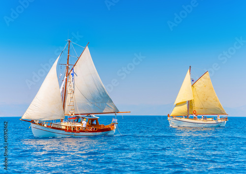 2 classic wooden sailing boats in Spetses island in Greece