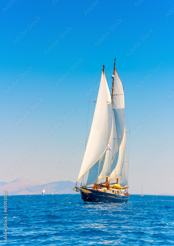 Obraz premium A Big 3 mast classic sailing boat in Spetses island in Greece