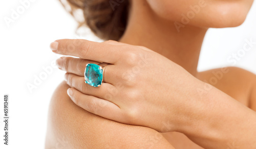beautiful woman with cocktail ring © Syda Productions