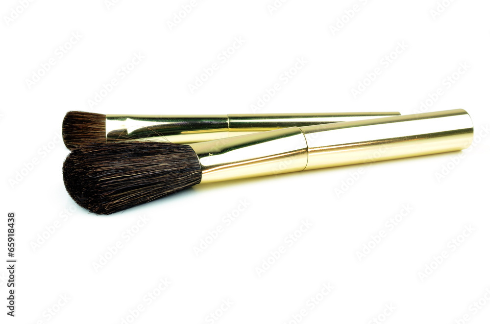 Fototapeta premium collection of make-up brushes over white