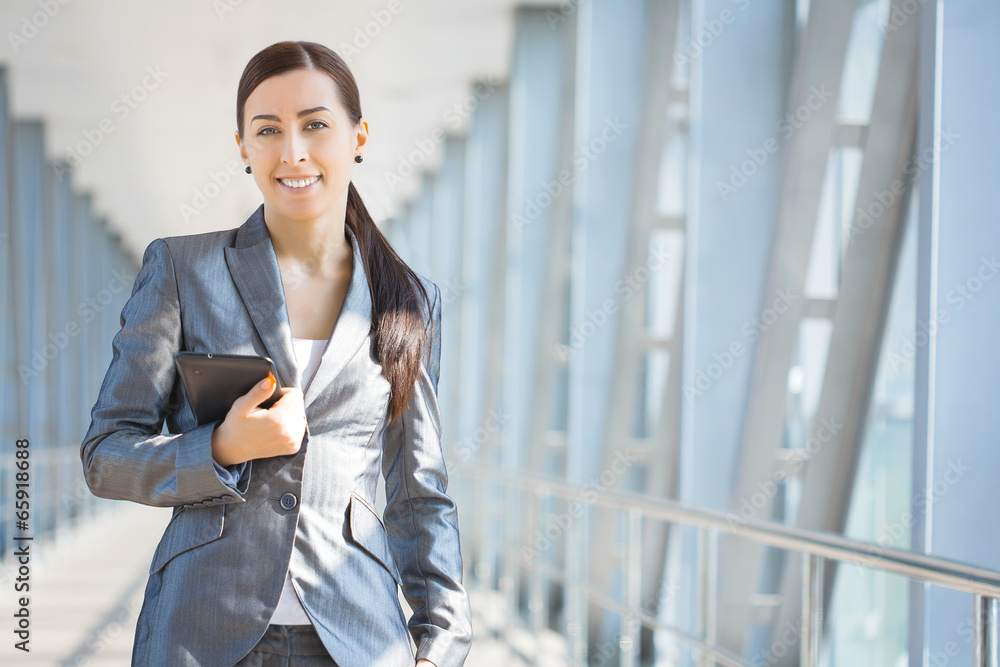 cute businesswoman on the blue modern background cute businesswoman on the blue modern background