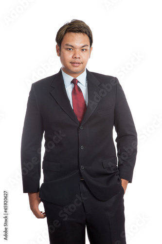 Asian businessman in suit smile