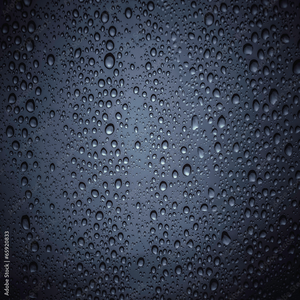 Drops of water on dark color glass Drops of water on dark color glass