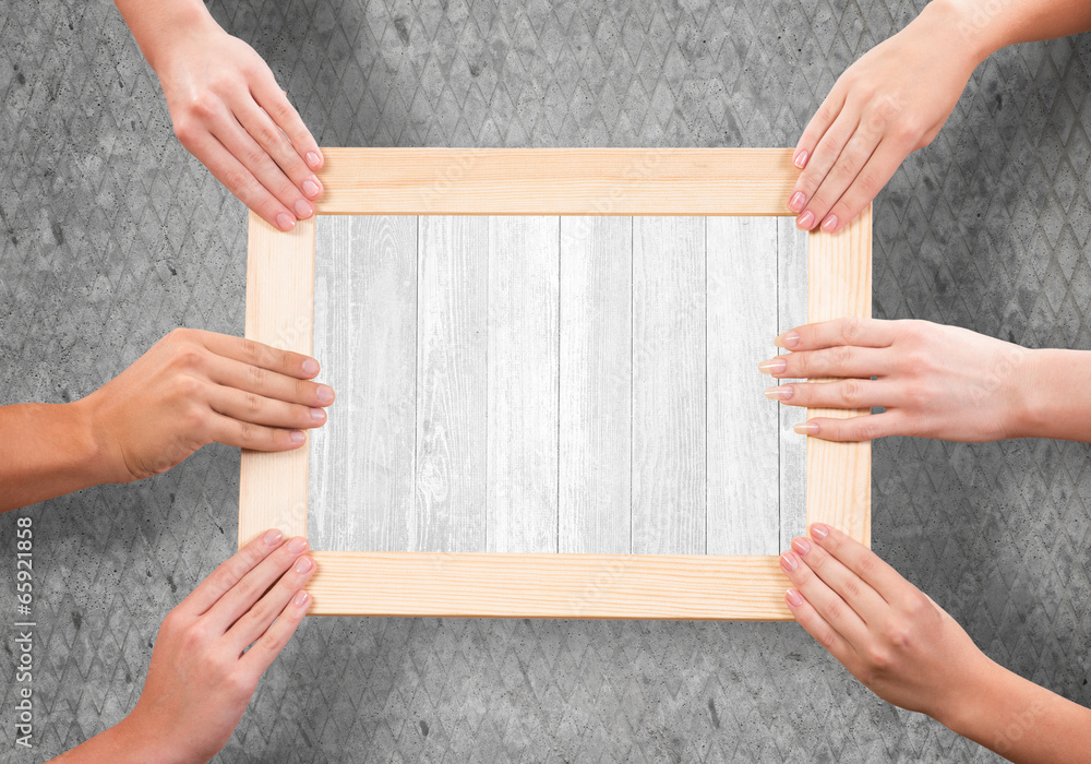 Hands holding frame Hands holding frame