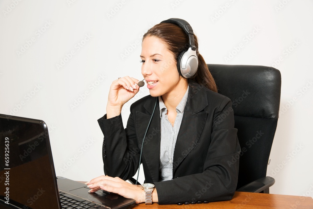 Business dressed female model in calling centar Business dressed female model in calling centar