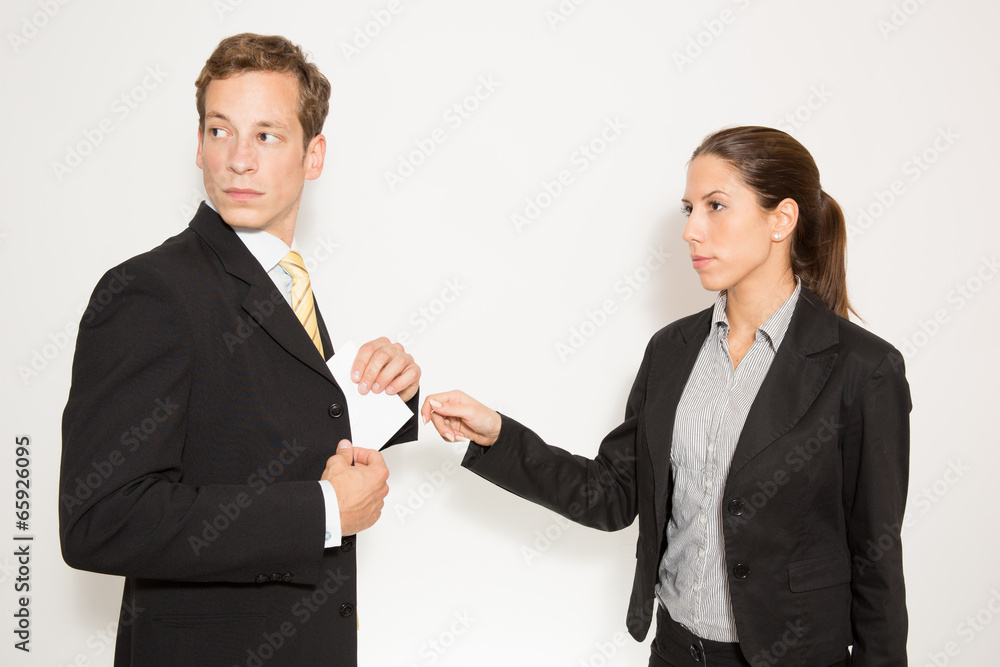 Business dressed male and female in different role plays. Business dressed male and female in different role plays.