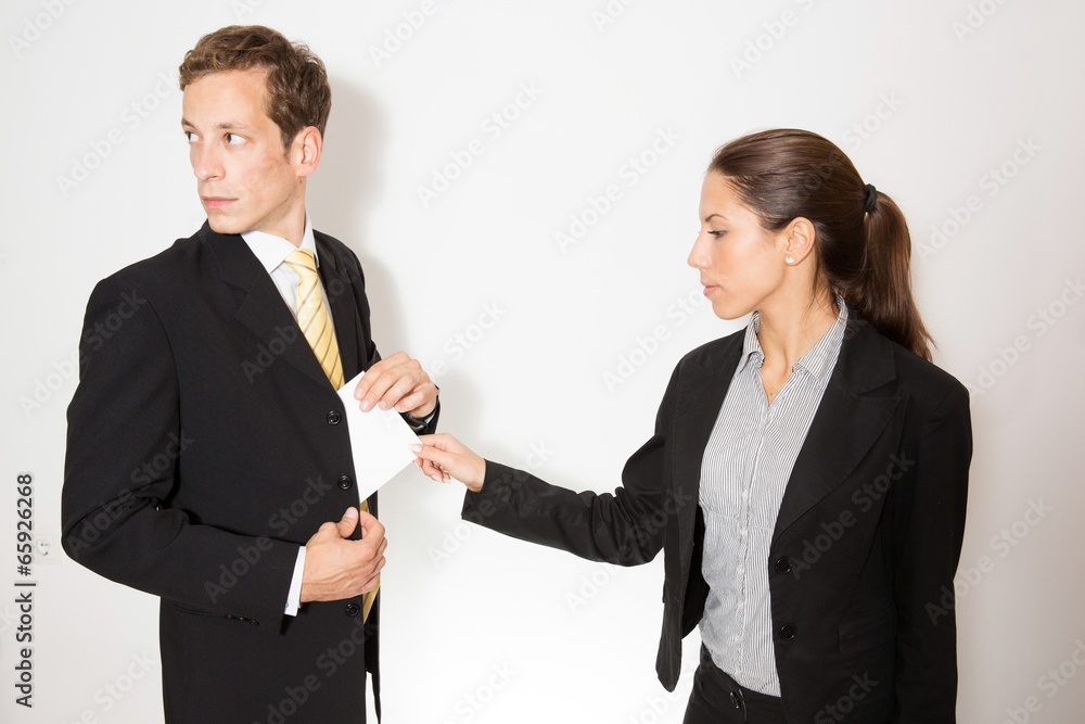 Business dressed male and female in different role plays. Business dressed male and female in different role plays.