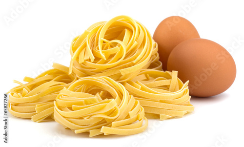 Italian egg pasta nest isolated on white background