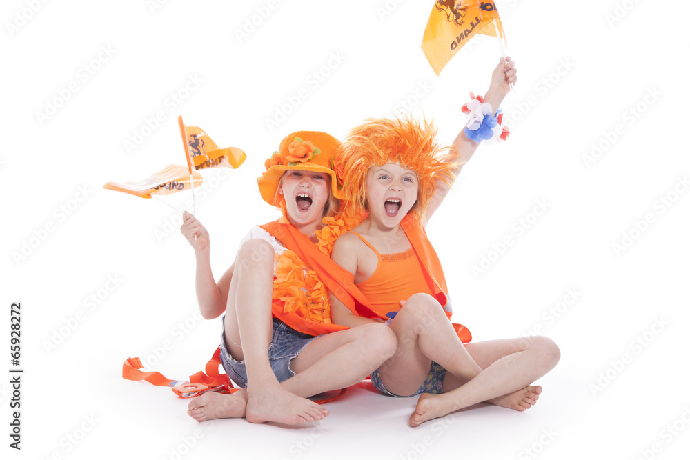 two girls in orange outfit cheering two girls in orange outfit cheering