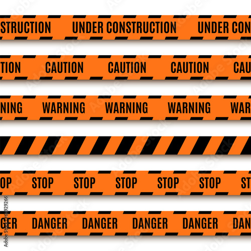 Set of orange warning tapes