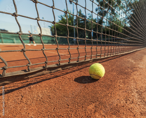 tennis ball and net © Myst