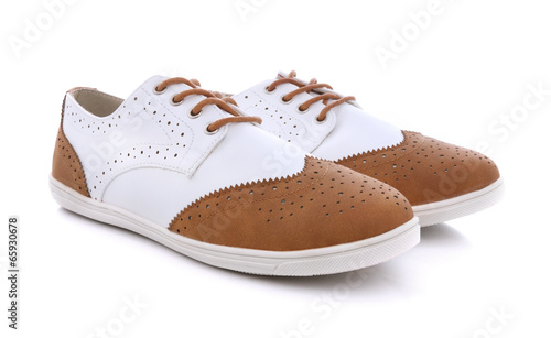 Laced shoes isolated over w...