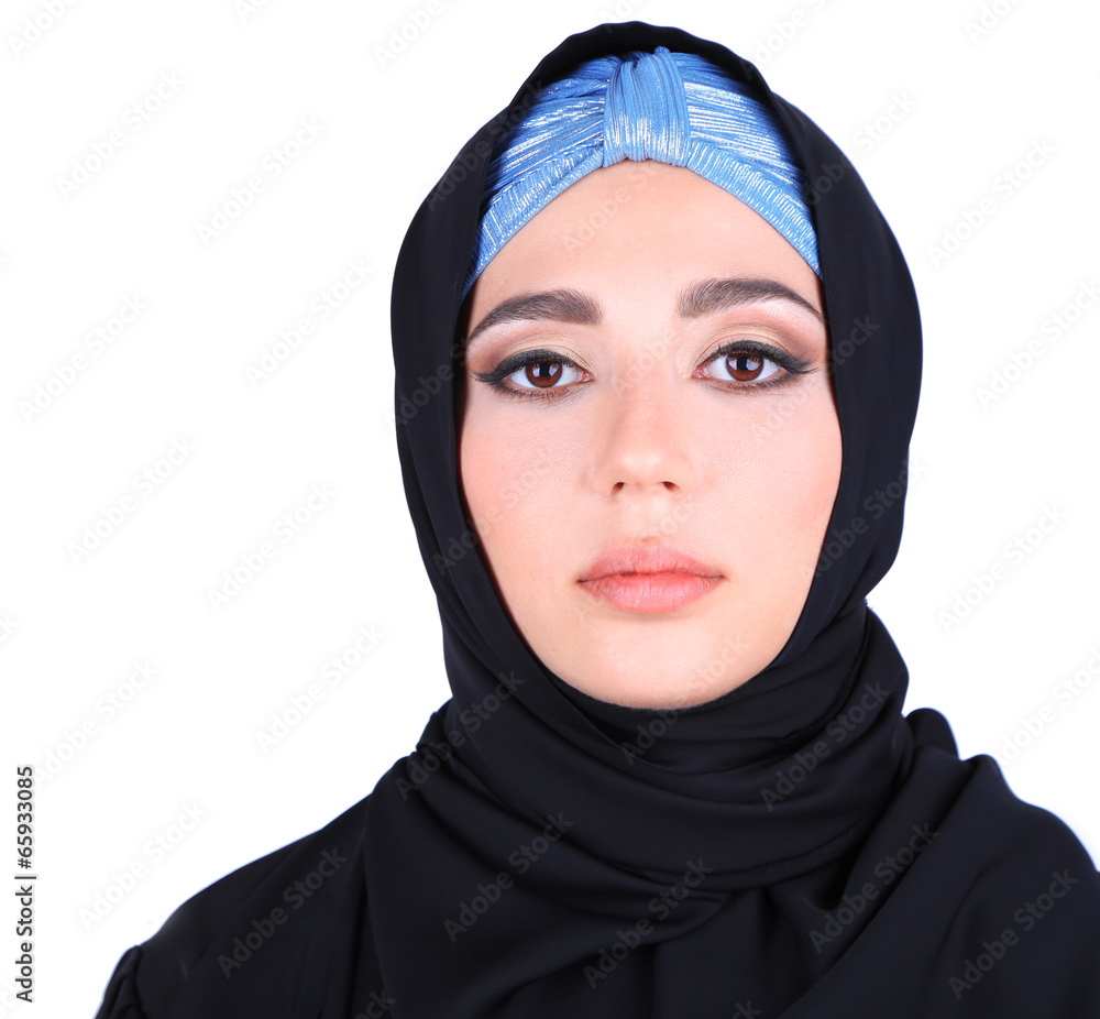 Beautiful muslim arabic woman on grey background Beautiful muslim arabic woman on grey background