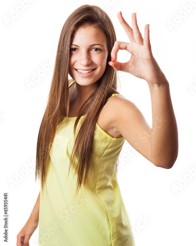 young woman with thumb up isolated on white