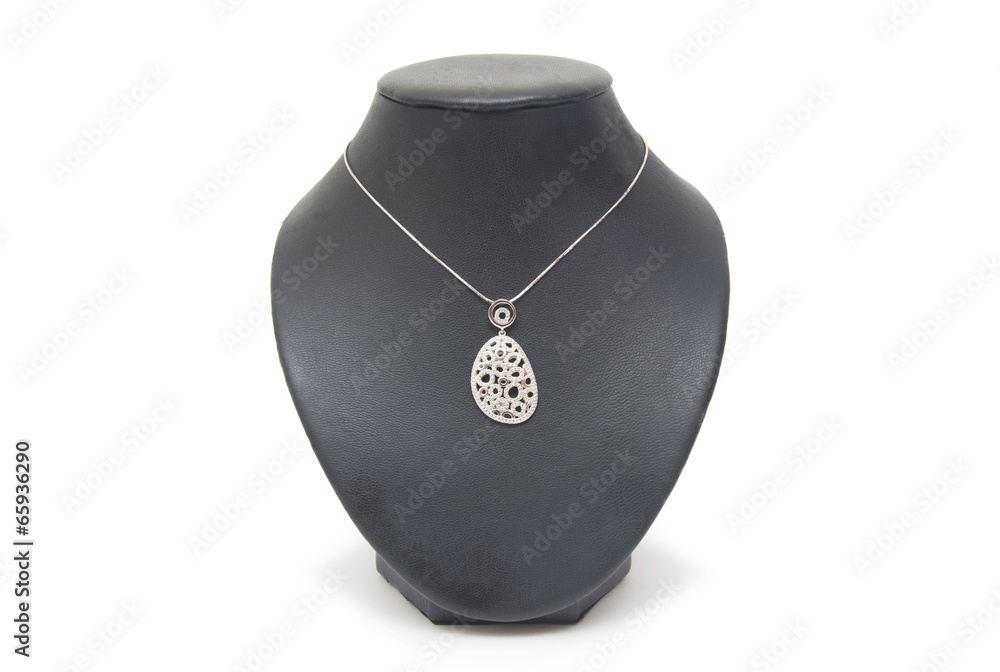 beautiful silver necklace on mannequin isolated on white beautiful silver necklace on mannequin isolated on white