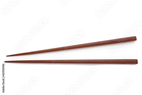 brown wooden chopsticks isolated on white photo