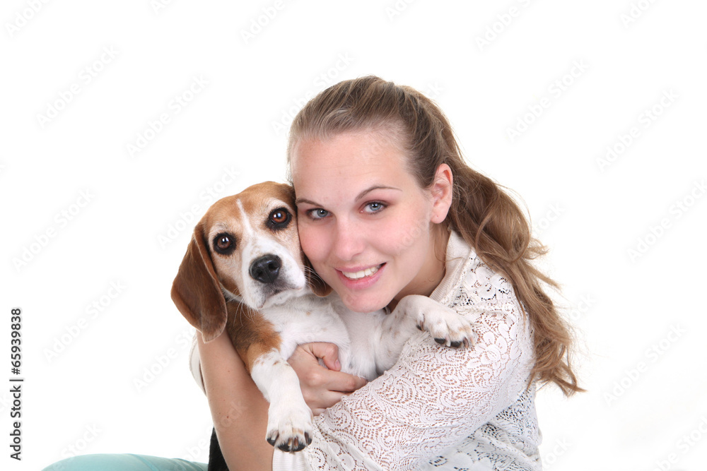 owner hugging pet Beage dog owner hugging pet Beage dog