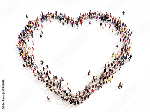 Large group of people in the shape of a heart.