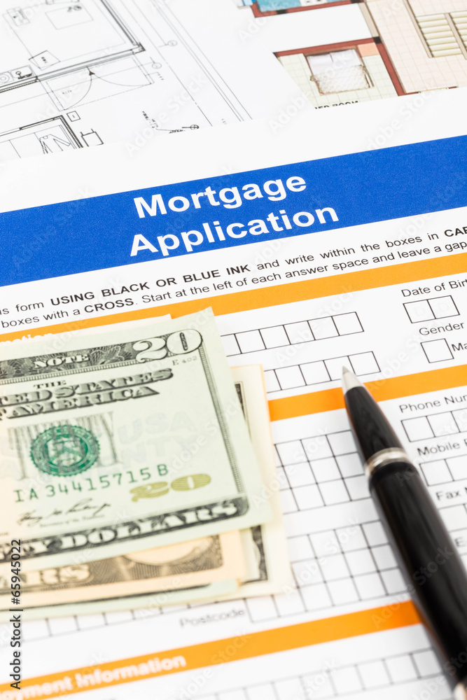 Mortgage application with pen, banknote, and drawing Mortgage application with pen, banknote, and drawing