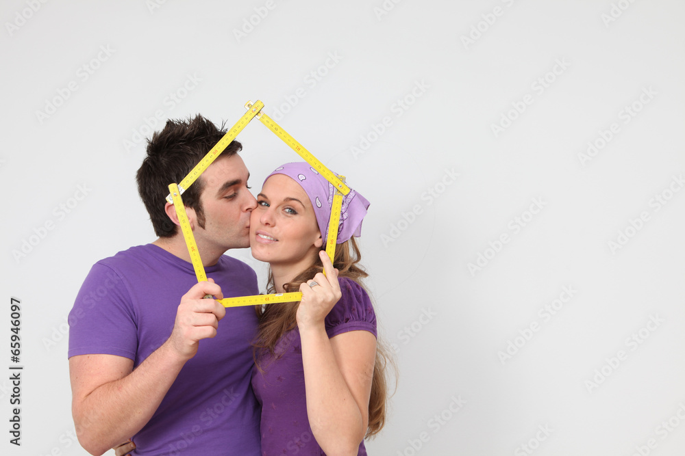 affectionate couple getting mortgage loan for new house concept affectionate couple getting mortgage loan for new house concept