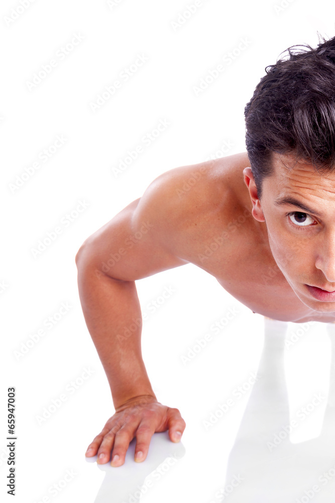 Cropped image of muscle man making push ups, isolated over a whi Cropped image of muscle man making push ups, isolated over a whi