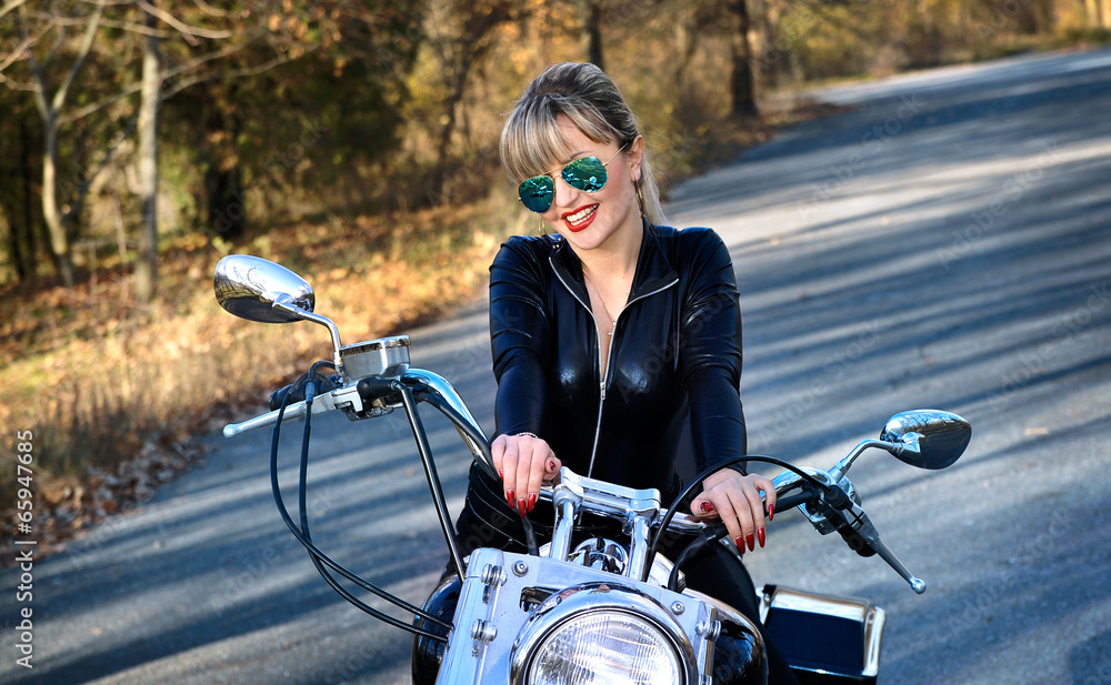 Young beautiful woman and bike
