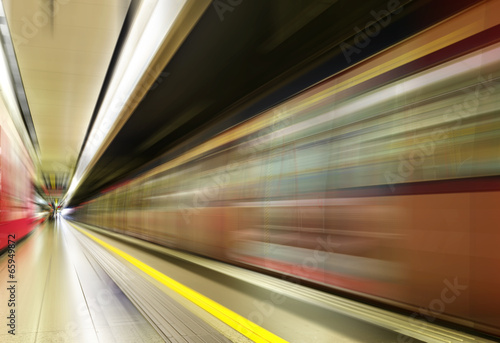 Image of subway train in motion blur.