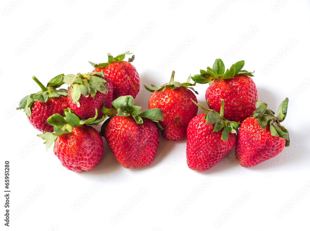 Red ripe strawberries on white background