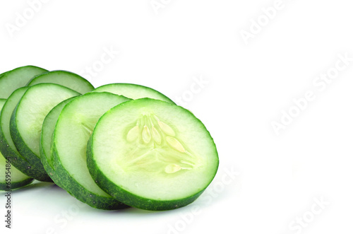 Cucumber and slices isolated over white background