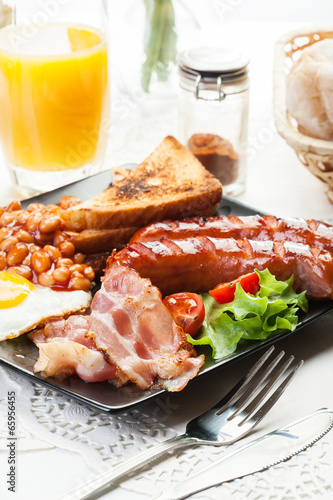 Full English breakfast with bacon  sausage  egg  baked beans and