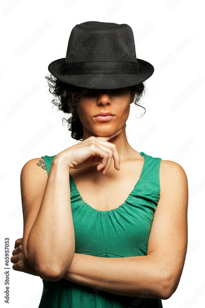 Ragazza sexy mora riccia con cappello Stock Photo | Adobe Stock