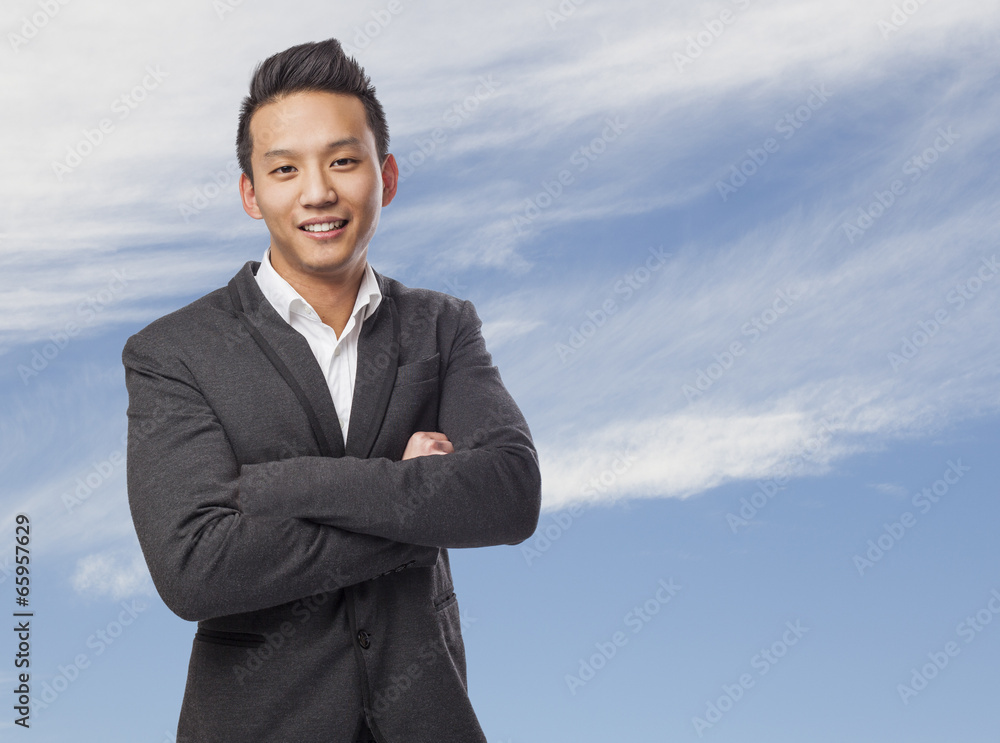 handsome young man standing wearing a suit handsome young man standing wearing a suit