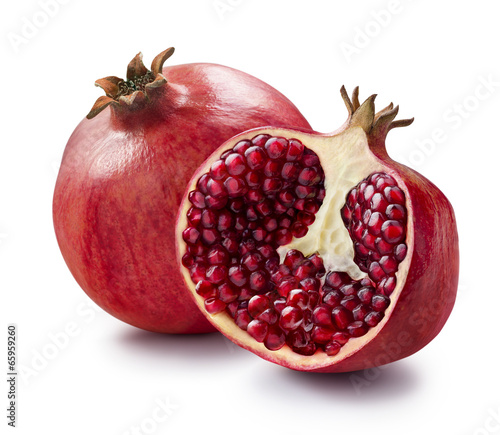 Whole and half of pomegranate isolated on white background
