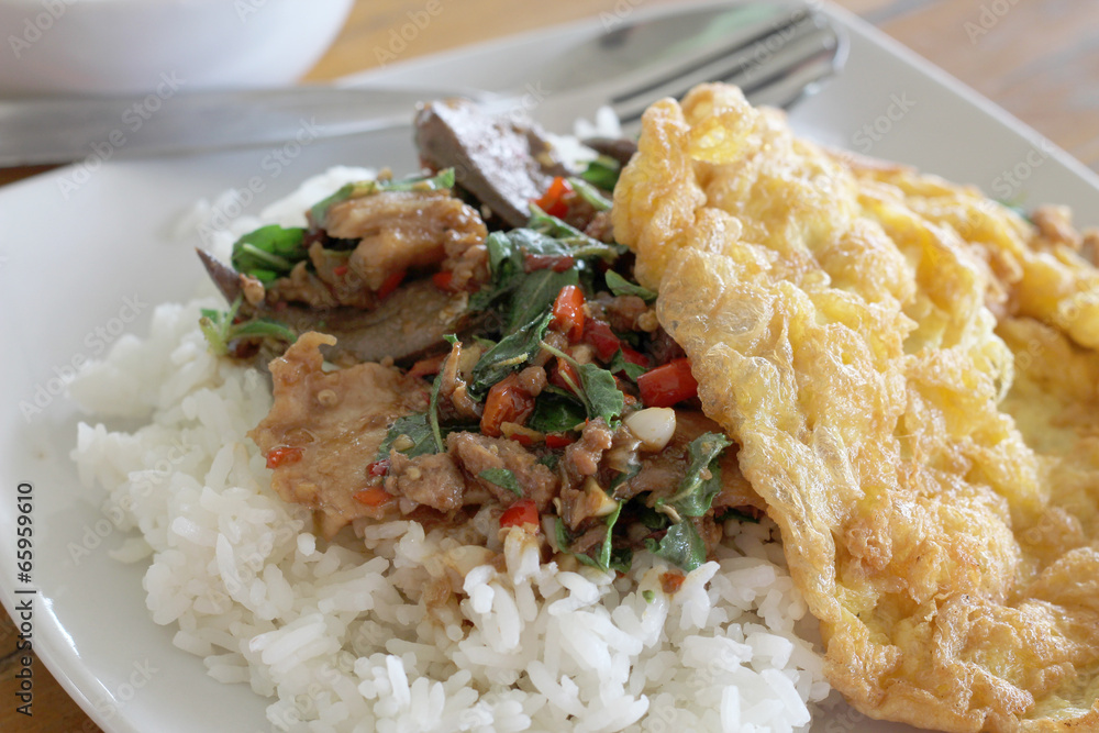 thai food. Fried basil leave with pork on rice omelette thai food. Fried basil leave with pork on rice omelette