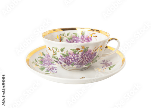 Porcelain teacup and saucer with floral ornament