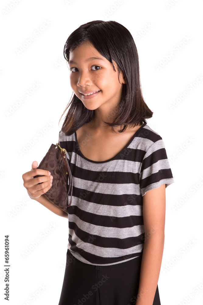 Young Asian Malay girl with a brown purse Young Asian Malay girl with a brown purse