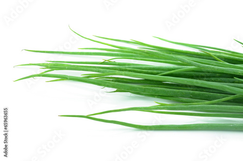 resh spring onions isolated on a white background