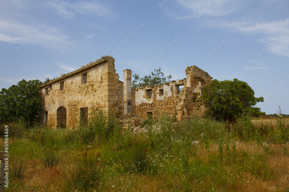 Ruins of old farmhouse in countryside