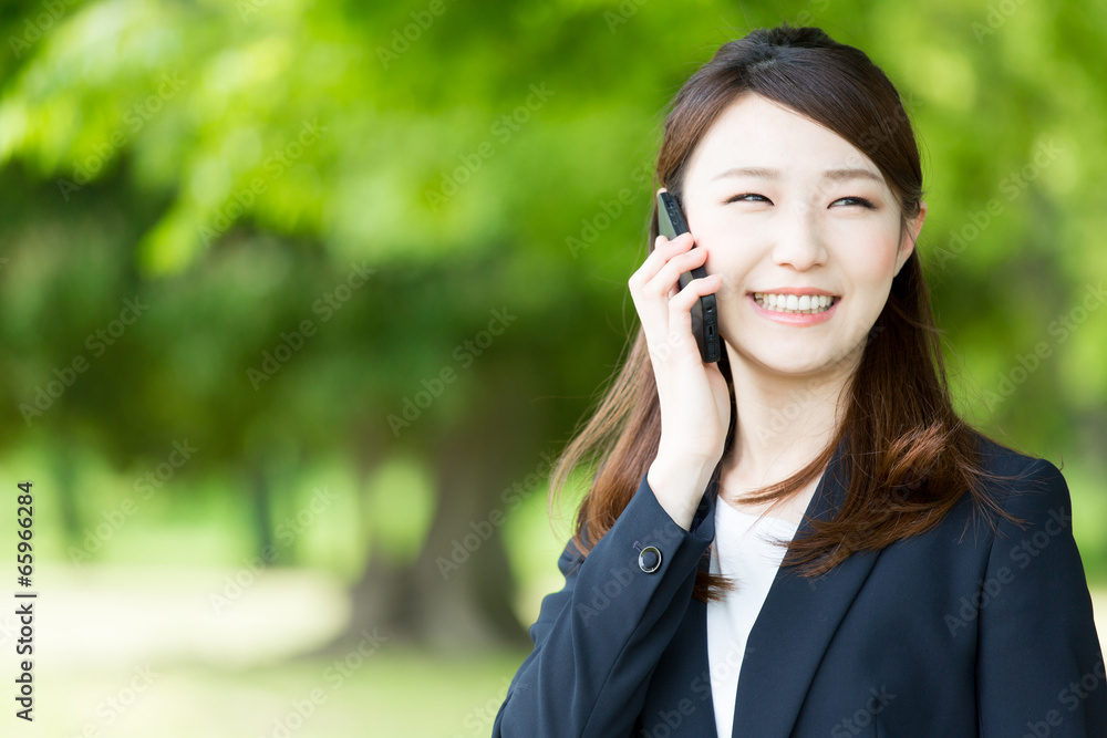 asian businesswoman using smart phone asian businesswoman using smart phone
