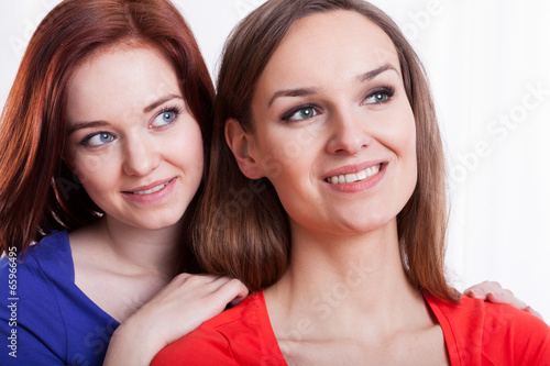 Close-up of a two smiling female friends