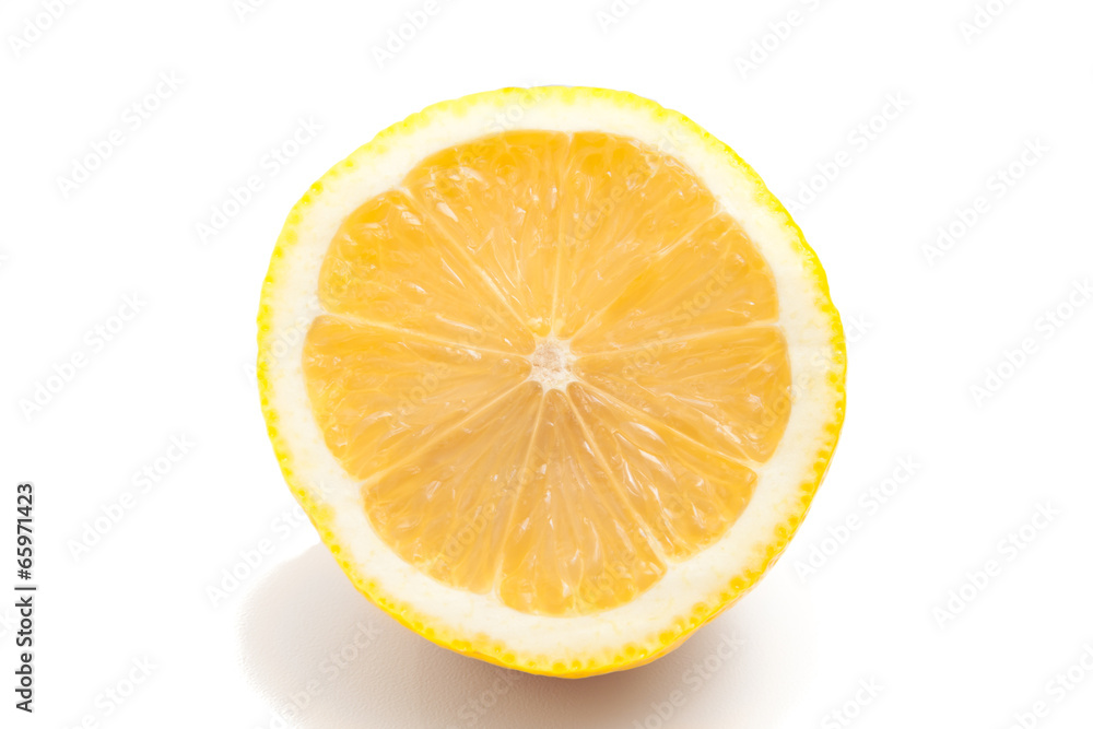 Ripe juicy lemon close-up on white background Ripe juicy lemon close-up on white background