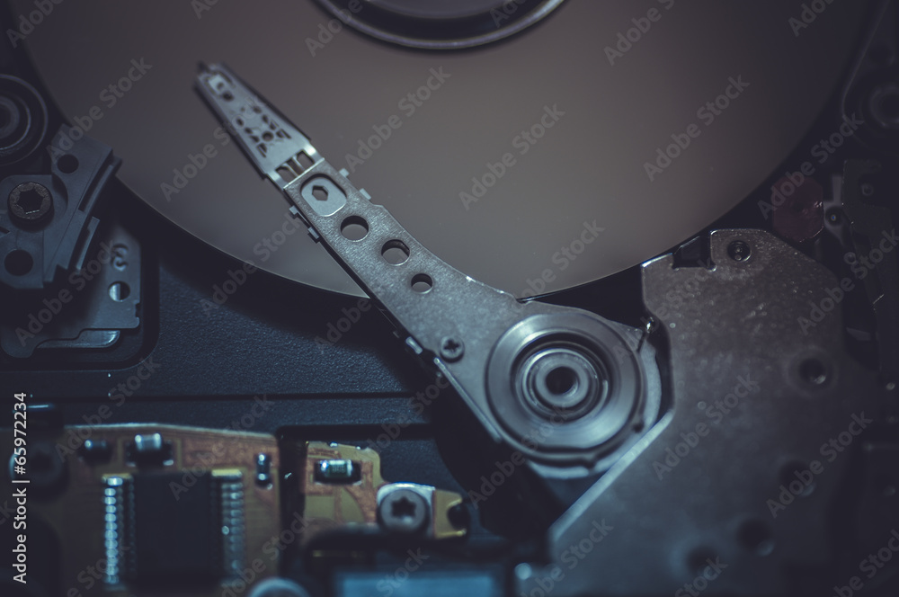 pc, mechanism inside hard disk with fiber optic lights pc, mechanism inside hard disk with fiber optic lights