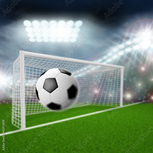 soccer ball flies into the goal