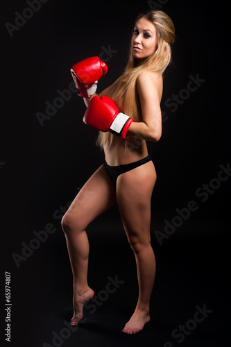 beautiful nude girl with boxing gloves