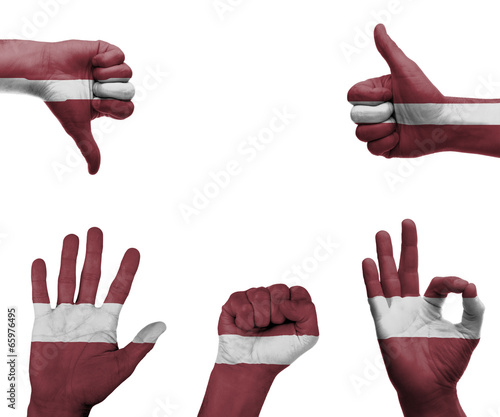 Hand set with the flag of Latvia