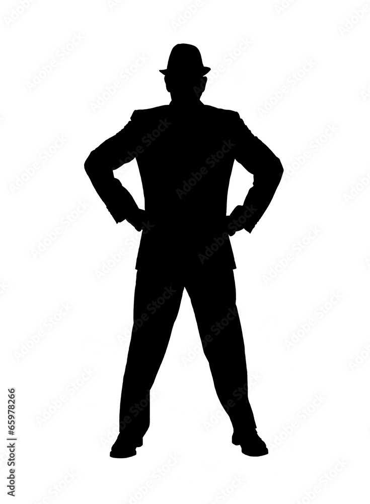 Silhouette of a Man With Hands on Hips