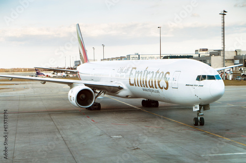 Boeing 777-300 Emirates on the airport, Prague photo