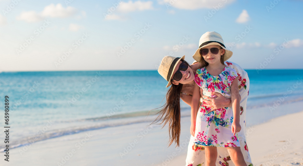 Portrait of mother and her adorable little girl enjoy summer Portrait of mother and her adorable little girl enjoy summer